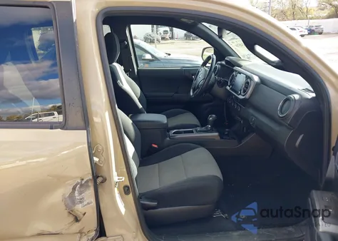 2020 Toyota Tacoma Trd Off-Road z USA, uszkodzony, nr VIN 3TMCZ5AN9LM350786